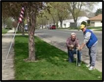 photo of American flags on an avenue
